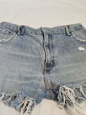 LEVI'S-Light Blue Distressed Denim Women’s Shorts